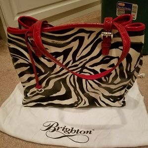 Great zebra and red shoulder bag
